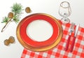 Vector Christmas table decorating setting. Festive cutlery set: fork, knife, empty plate on tablecloth with spruce Royalty Free Stock Photo
