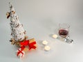 Christmas table decoration banner. White hand made fir. Craft paper red gift boxes recycle materials candle lights glass Royalty Free Stock Photo