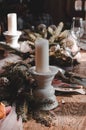 Christmas table decoration. Candle on a decorated Christmas table Royalty Free Stock Photo