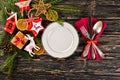 Christmas table decoration. Christmas dinner plate, cutlery decorated festive decorations. Winter holidays. Christmas card. Royalty Free Stock Photo