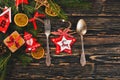 Christmas table decoration. Christmas dinner plate, cutlery decorated festive decorations. Winter holidays. Christmas card. Free Royalty Free Stock Photo