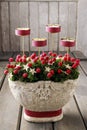 Christmas table decoration with red berries and candles Royalty Free Stock Photo