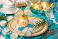 Christmas table decoration in turquoise colors