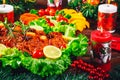 Christmas table dinner time with roasted meats, candles and New Year dÃÂ©cor. Background thanksgiving day.