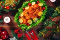 Christmas table dinner time with roasted meats decorated in Christmas style. Background thanksgiving. The concept of a family holi Royalty Free Stock Photo