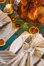 Christmas table, festive baked turkey, and served table. Vertical frame