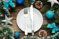 Christmas table place setting with blue and silver decoration on grey. Holidays background Royalty Free Stock Photo