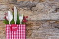 Christmas table place setting, rustic wooden background, copy space Royalty Free Stock Photo