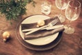 Christmas table place setting in vintage or rustic style. Royalty Free Stock Photo