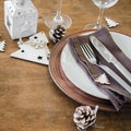 Christmas table place setting in vintage or rustic style. Royalty Free Stock Photo