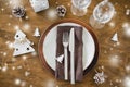 Christmas table place setting in vintage or rustic style. Royalty Free Stock Photo