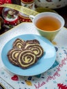 Homemade Christmas cookies with a cup of tea, top view over a rustic wood background Royalty Free Stock Photo