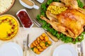 Christmas table served with turkey, decorated with kale and cranberry Royalty Free Stock Photo