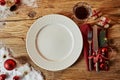 Christmas table set with decorations and a plate Royalty Free Stock Photo