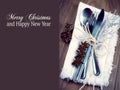 Christmas table setting, christmas menu concept in silver, brown and white color tone with copy space Royalty Free Stock Photo