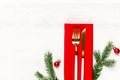 Christmas laying table appointments, table setting options. Silverware, tableware items with festive decoration