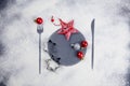 Christmas table setting decoration. Cookies, stars and balls. Flour imprint of fork, plate and knife. Christmas aesthetics