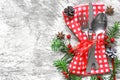 Christmas table setting with festive decorations on kitchen napkin