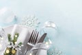 Christmas table setting for holiday dinner. Bokeh effect. Copy space for menu Royalty Free Stock Photo