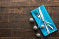 Christmas table setting. Knife and fork with blue napkin. on a brown wooden table. top view with space for an inscription. new Yea Royalty Free Stock Photo