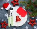 Christmas table setting place with festive decorations and empty Royalty Free Stock Photo