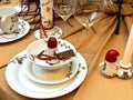 Christmas table setting with white festive plates Royalty Free Stock Photo