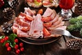 Christmas table with sliced ham and meats Royalty Free Stock Photo