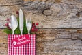 Christmas cutlery on wooden table background Royalty Free Stock Photo