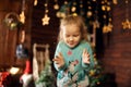 A Christmas tale for a little girl. Unforgettable childhood memories. A girl makes a wish on Christmas night Royalty Free Stock Photo