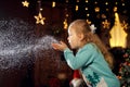 A Christmas tale for a little girl. Unforgettable childhood memories. A girl makes a wish on Christmas night Royalty Free Stock Photo