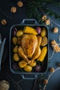 Christmas dinner table with chicken on dark Royalty Free Stock Photo