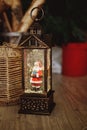 Christmas lantern with decoration and snow flakes. retro lantern night light, with santa claus. snowflakes crystal Royalty Free Stock Photo