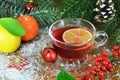 Christmas tea in transparent cup and Christmas decoration Royalty Free Stock Photo