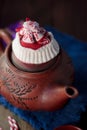 Christmas teapot with the red santa hat on it Royalty Free Stock Photo