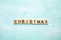 Christmas text design background. Wooden sign in snow written text top view, Holiday,merry Christmas concept background Royalty Free Stock Photo