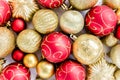 Christmas texture: red and gold glass Christmas balls on a white background. the apartment lay, top view Royalty Free Stock Photo