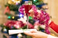 Christmas theme-a glass of Red sparkling wine in a female hand Royalty Free Stock Photo