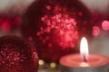 Christmas theme in red and glittering accessories and candle