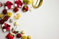 Christmas theme with red and golden ornaments and copy space. Royalty Free Stock Photo