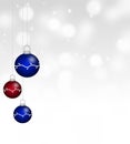 Christmas theme with three ornaments on grey background