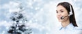 Christmas theme woman with headset smiling isolated on christmas Royalty Free Stock Photo