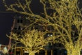 Christmas time city decoration. Lights and toys on the city street during winter holiday season. Festive illuminations in the Royalty Free Stock Photo