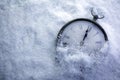 Christmas Time Clock under snow, countdown to midnight Royalty Free Stock Photo