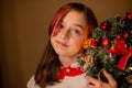 Christmas time. happy New Year. Pretty girl with a Christmas tree