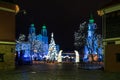 Christmas time in Kaunas town hall square, Lithuania illuminated buildings and decorations, night scene