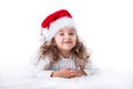 Christmas time, little girl in Santa Claus hat smilling Royalty Free Stock Photo