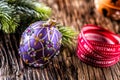 Christmas Time. Luxury golden purple blue christmas ball and decoration.Red ribbon with text happy christmas