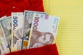 Christmas time on US dollar and Ukrainian hryvnia bills of gifts christmas red socks Royalty Free Stock Photo