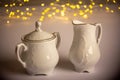 It is Christmas time, when we put beautiful porcelain dishes on the table and turn on the lights. Sugar bowl and coffee creamer