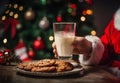 Christmas time. Santa Claus with glass of milk and chocolate gingerbread cookies Royalty Free Stock Photo